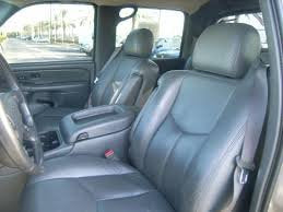 Durafit Seat Covers, 2003-2007 Chevy Silverado, Suburban and Avalanche Front Captain Chairs with Dual Electric Seats. No Side Im