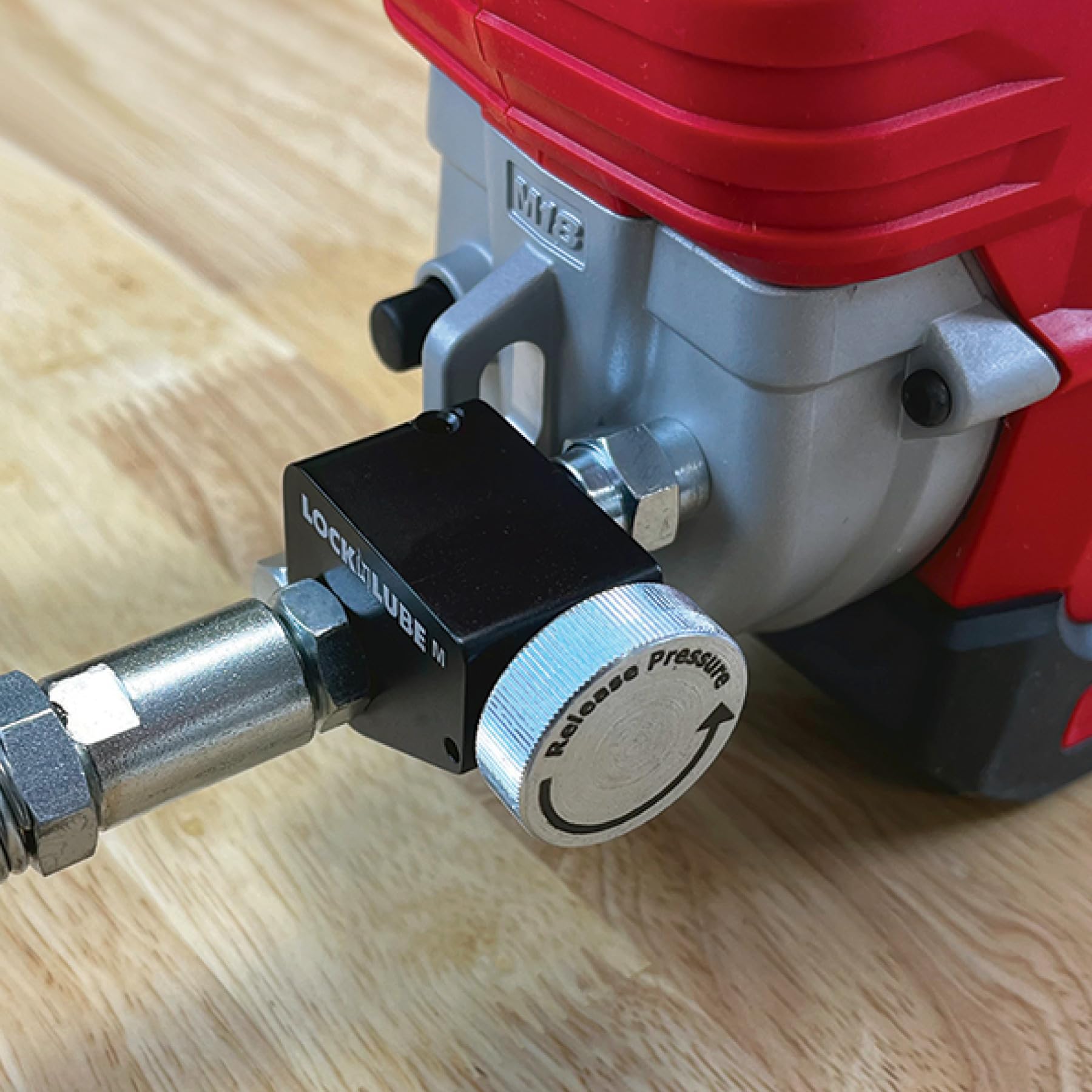 LockNLube Pressure Return Valve For Use With Cordless Grease Guns. No more pressure locks! Returns grease to the tube. Releases